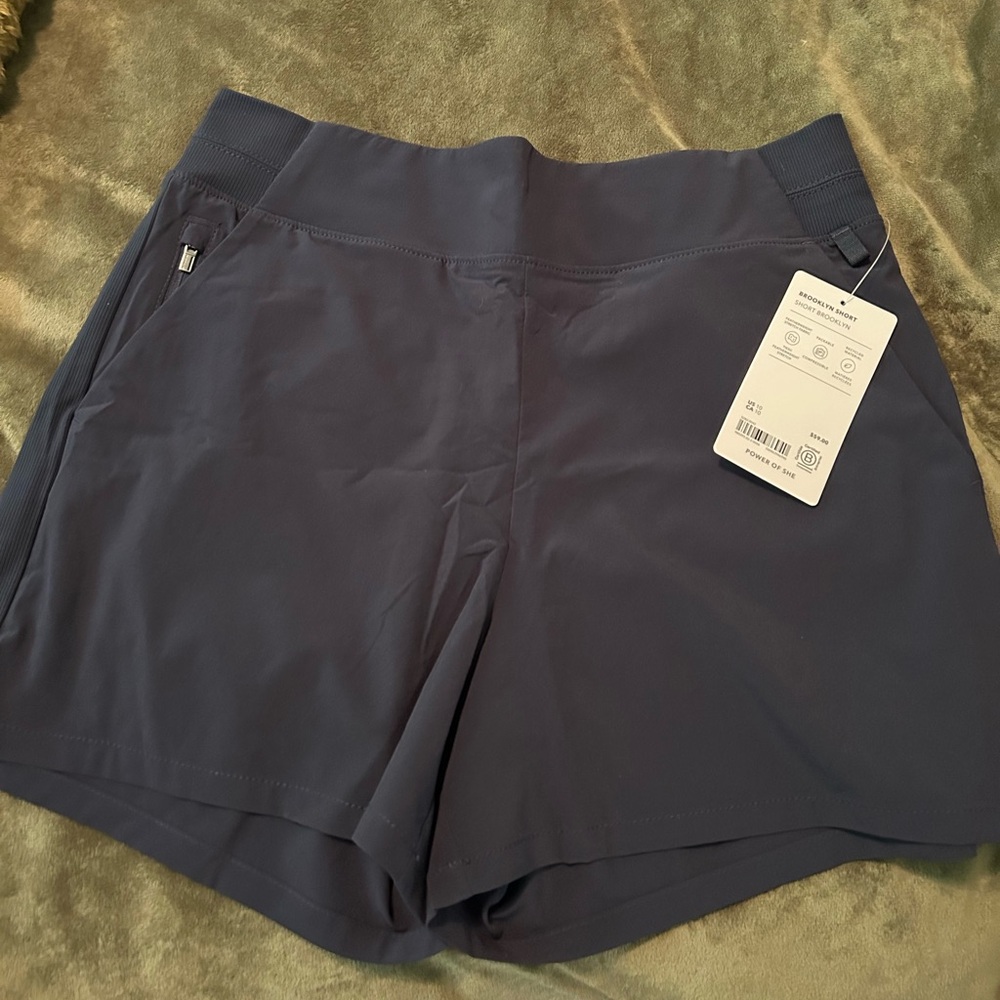 Athleta Blue Brooklyn Athletic Shorts with Mid-Thigh Cut